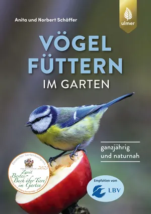 Vögel füttern im Garten